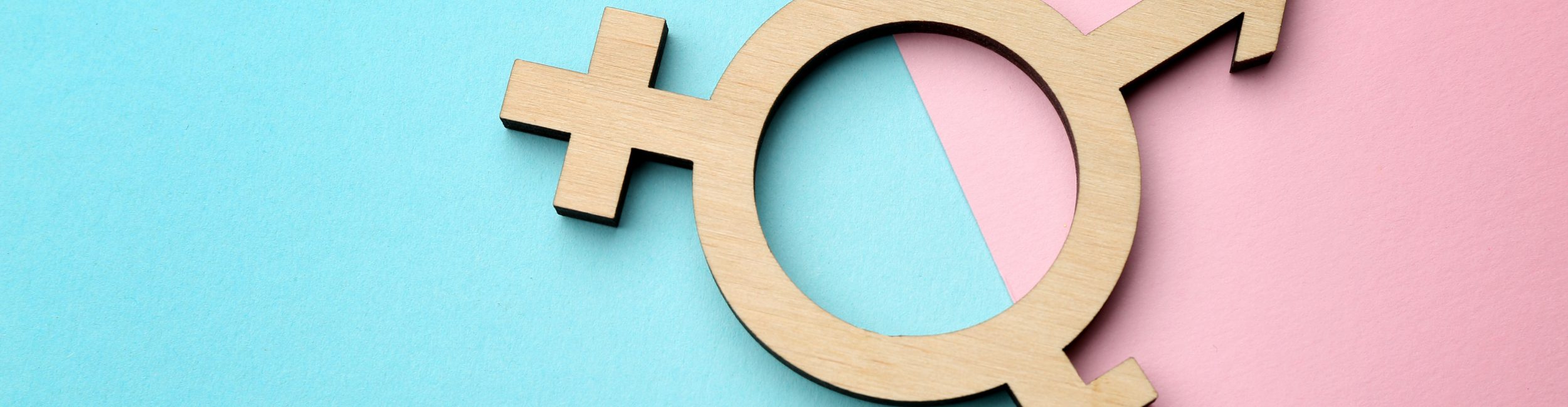 Gender symbol on a pink and blue background