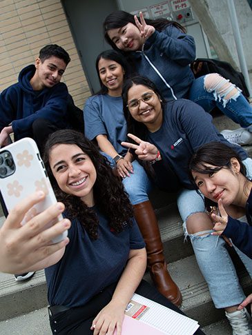 students taking a group selfie