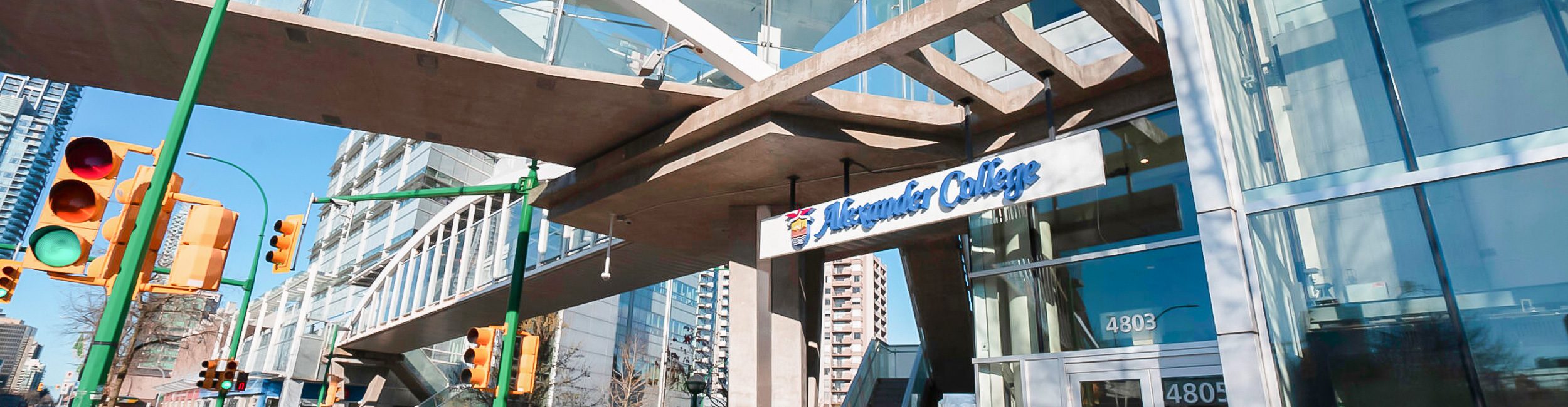The Alexander College sign above the main entrance of Burnaby campus