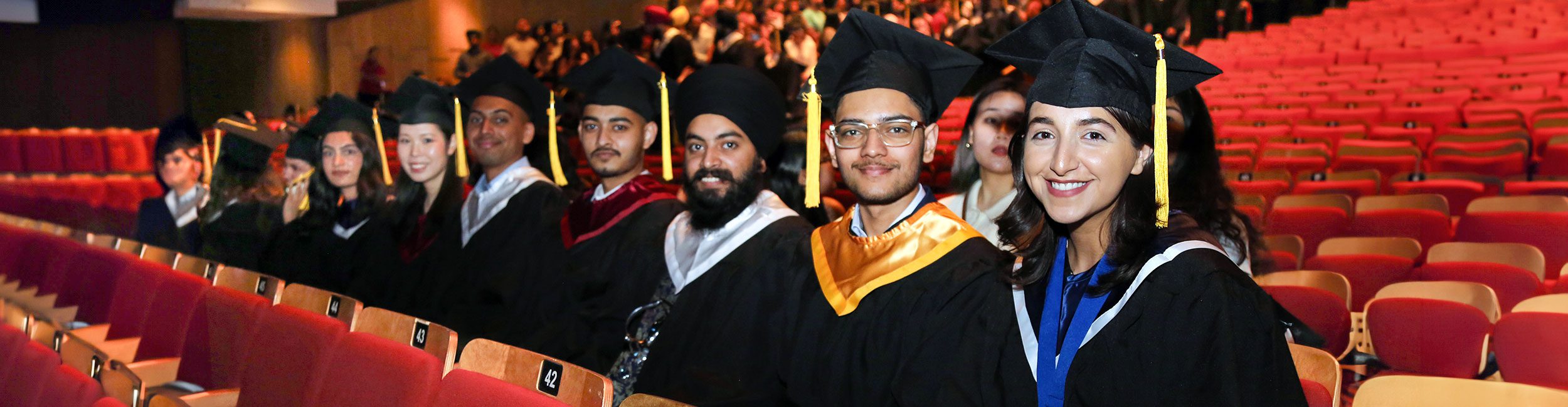 A row of students getting ready for the Convocation Ceremony